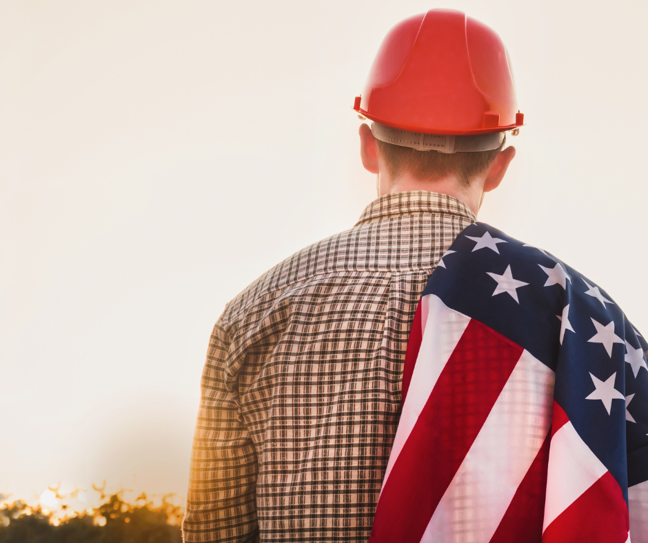 Man with hard hat and american flag